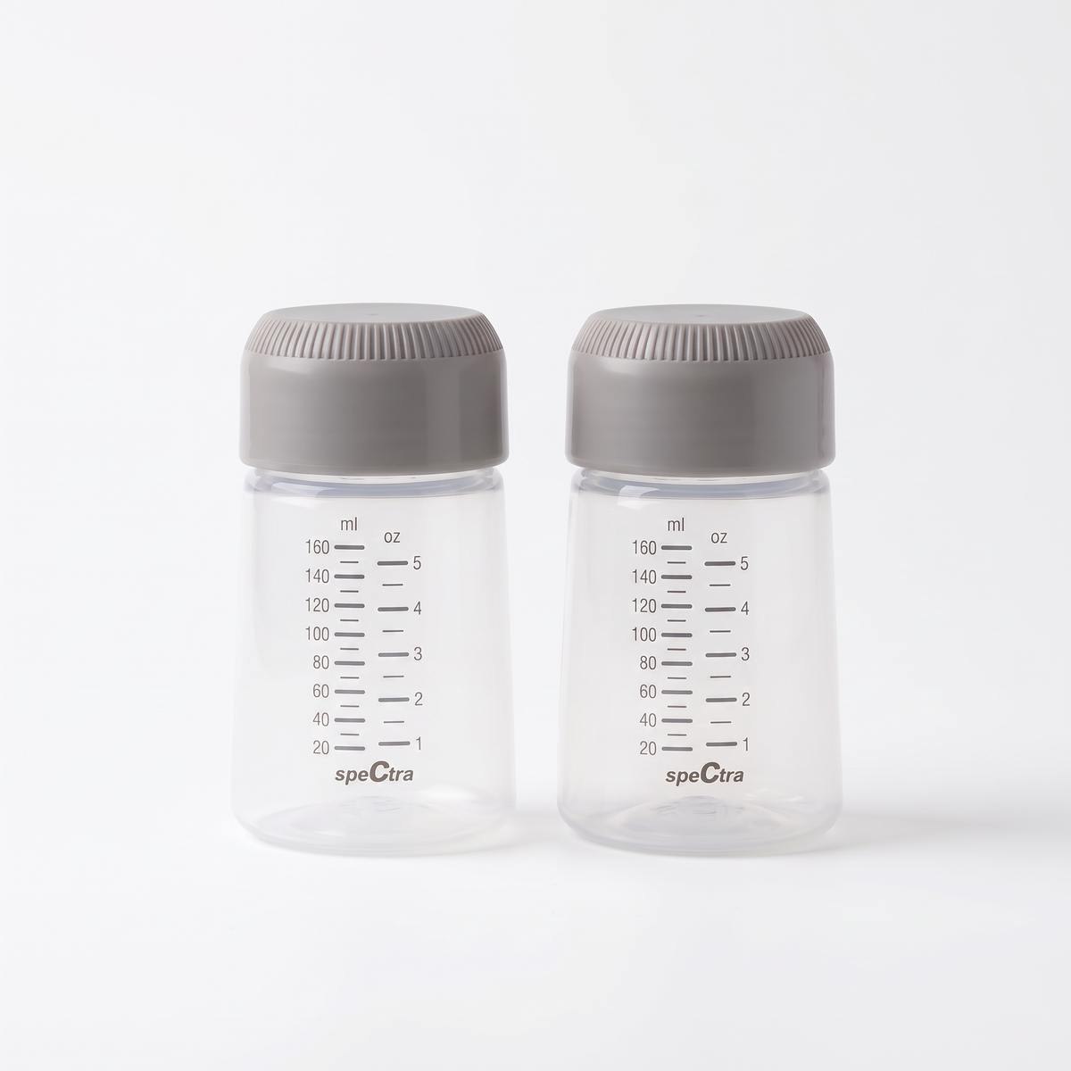 Two Spectra 160mL milk storage bottles with grey airtight caps