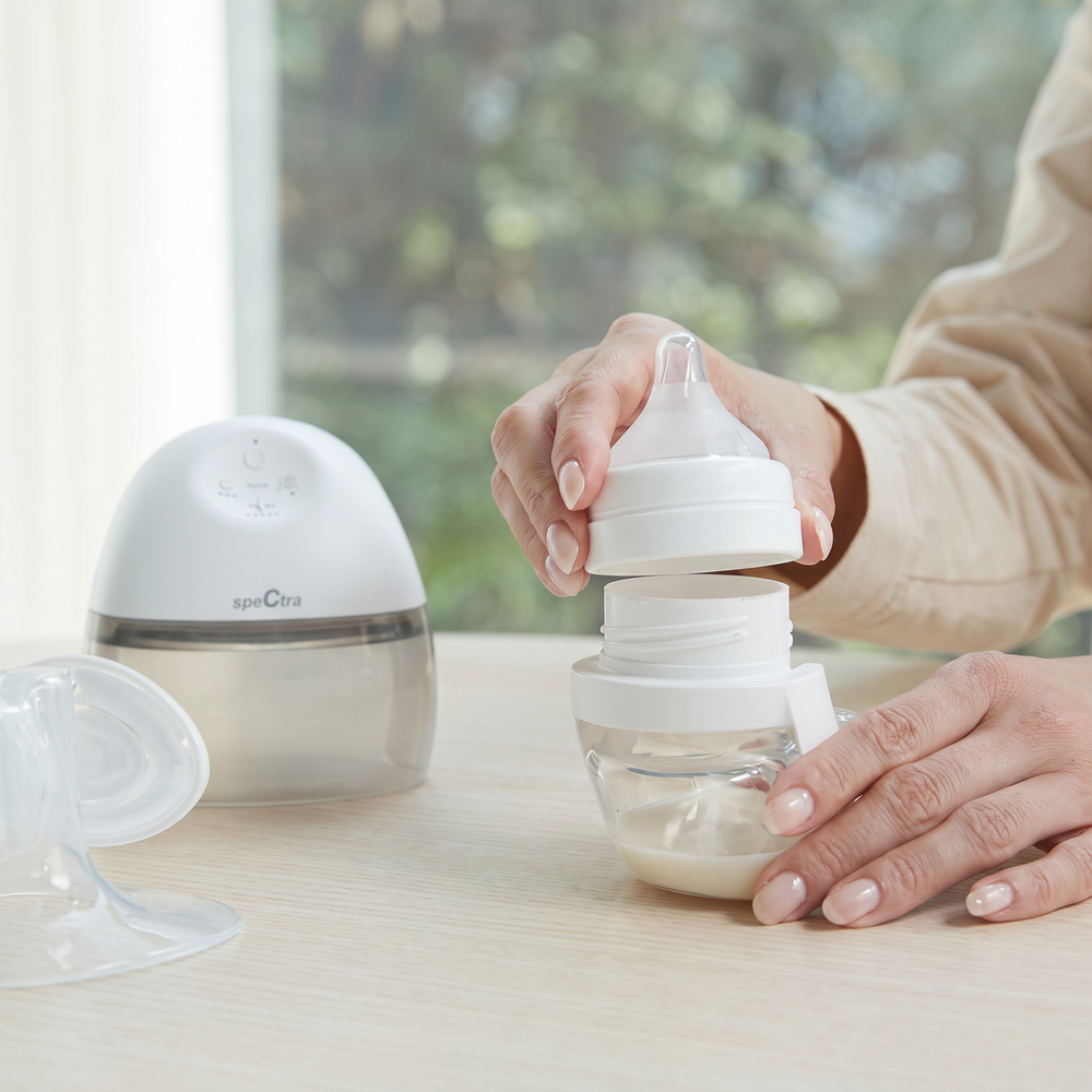 Assembling the Spectra Wearable pump bottle by a window